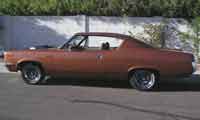 AM side view classic car The Machine